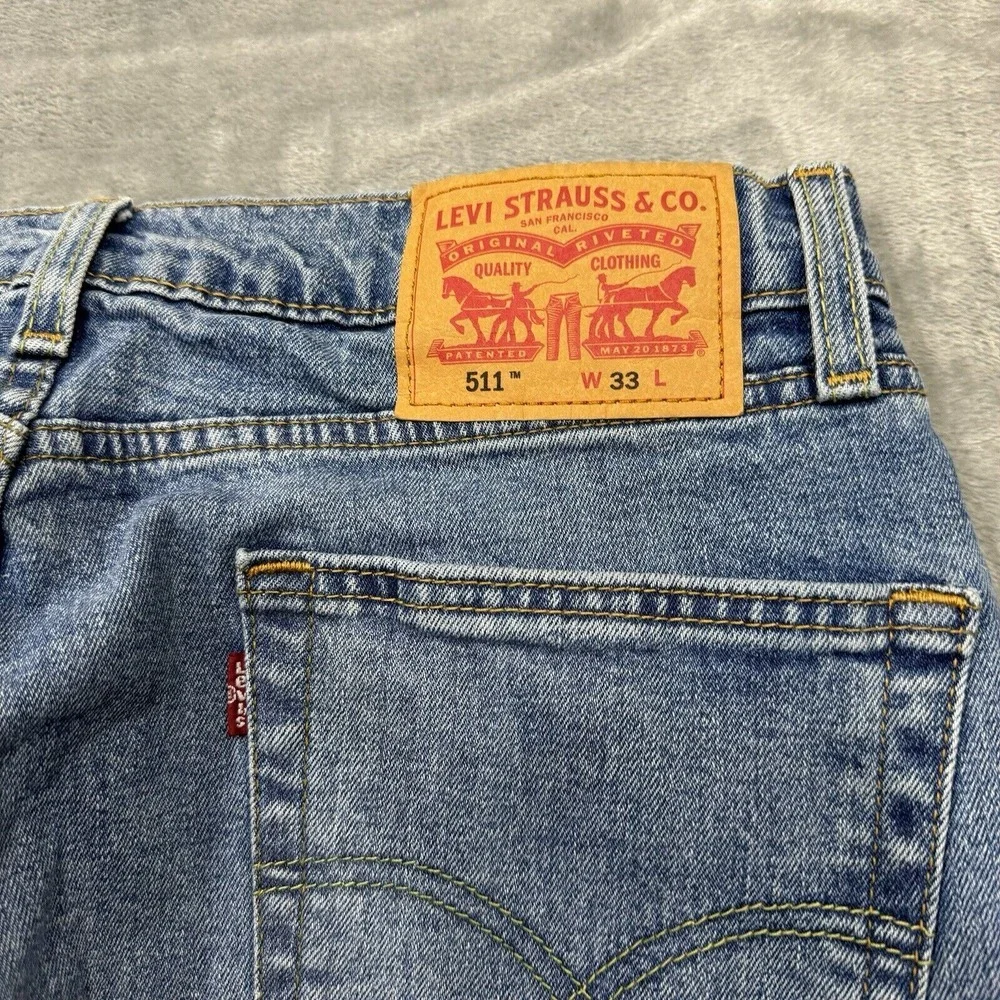 Levis Shorts Mens 33 Blue 511 Slim Cut Off Medium Wash Denim Pockets Logo Casual
